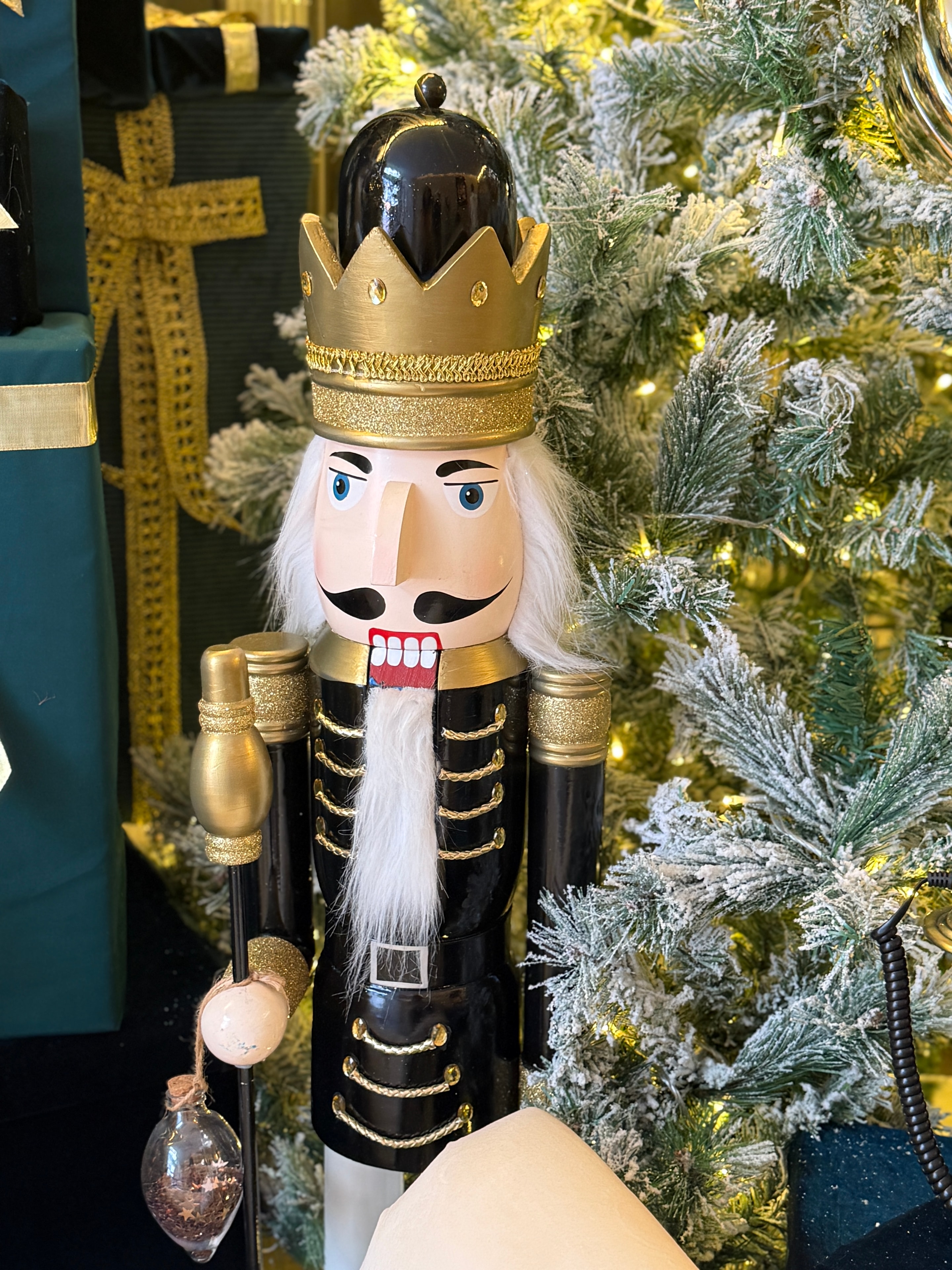 Decorative nutcracker ornament with Christmas tree